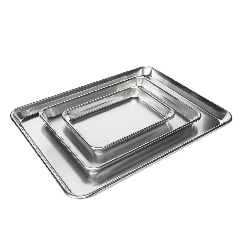 Set of three aluminum trays in varying sizes