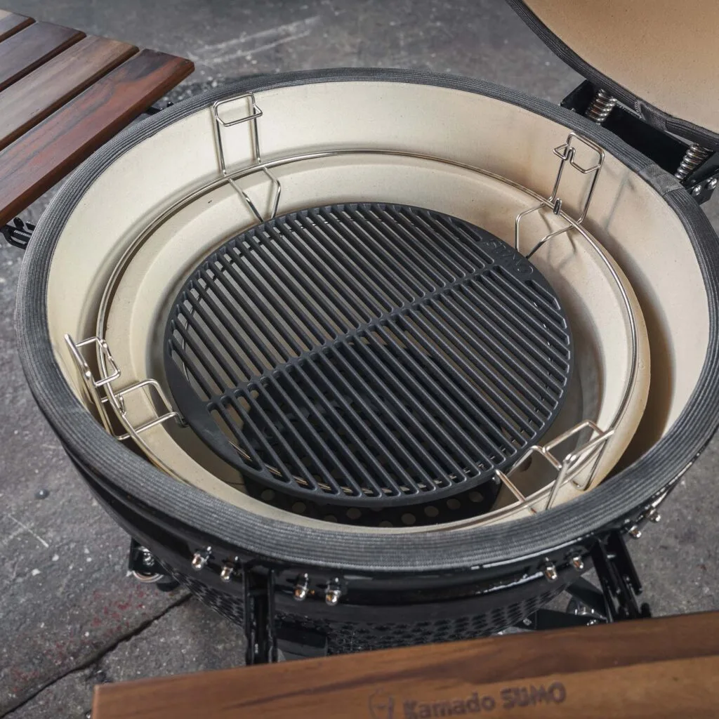 Kamado Sumo ceramic grill interior with cast iron cooking grid