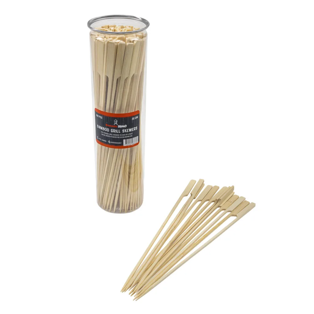 Bamboo grill skewers in a clear container