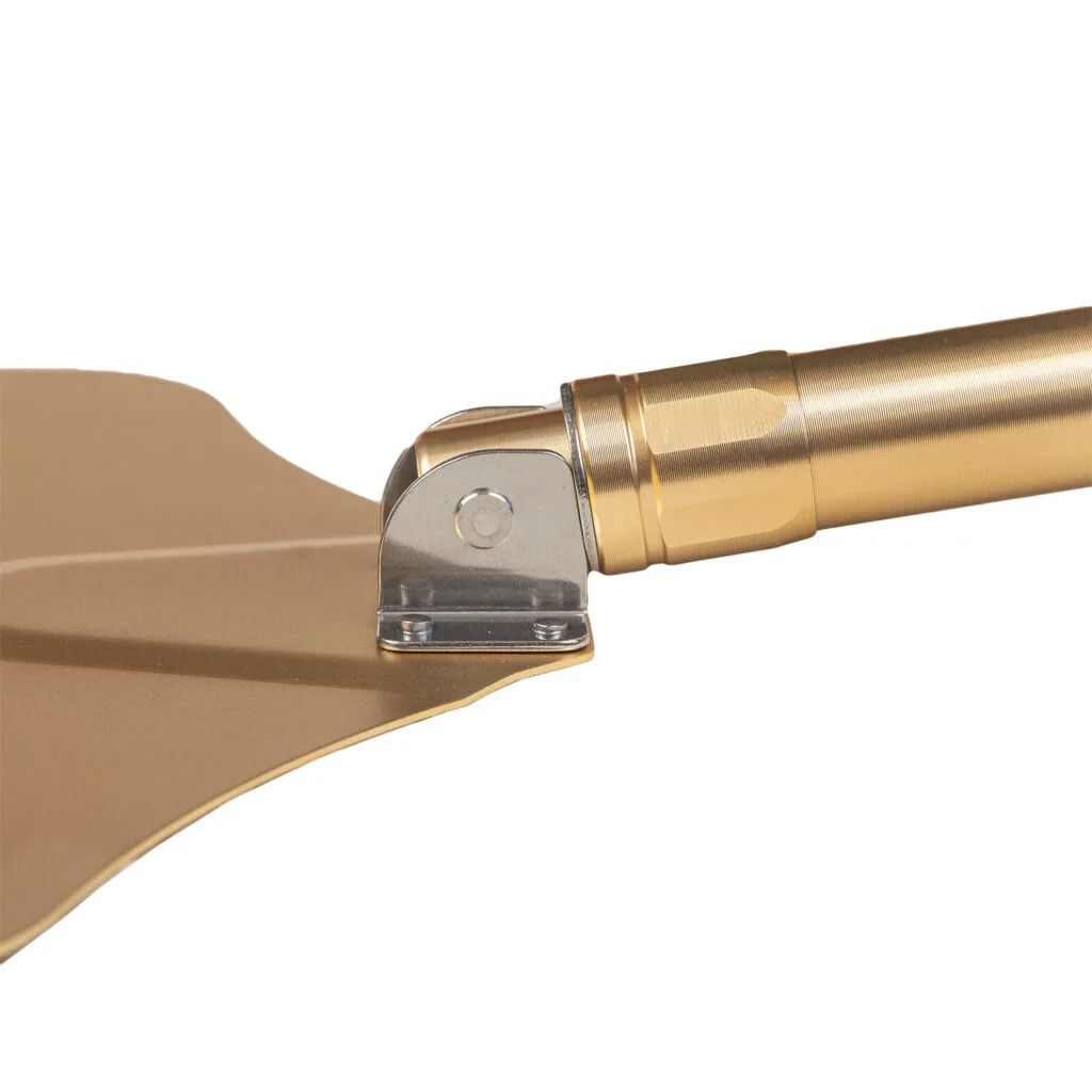 Close-up of Kamado Sumo foldable pizza peel with gold finish