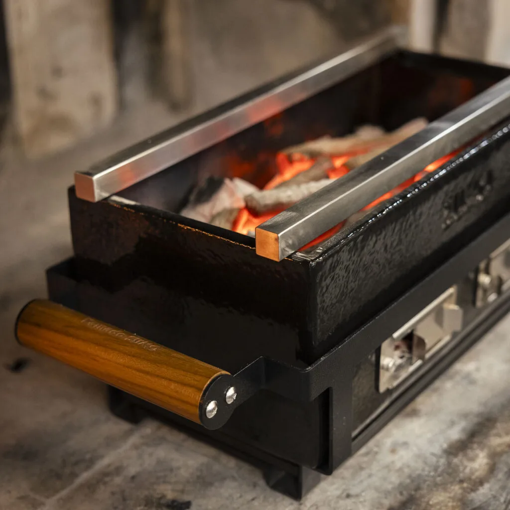 Kamado Sumo premium ceramic grill with glowing charcoal