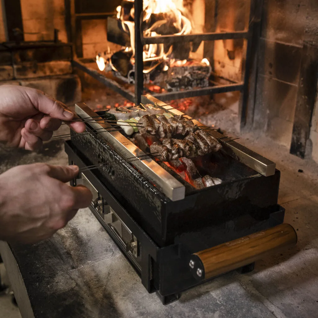 Grilling skewers on a Kamado Sumo hibachi grill