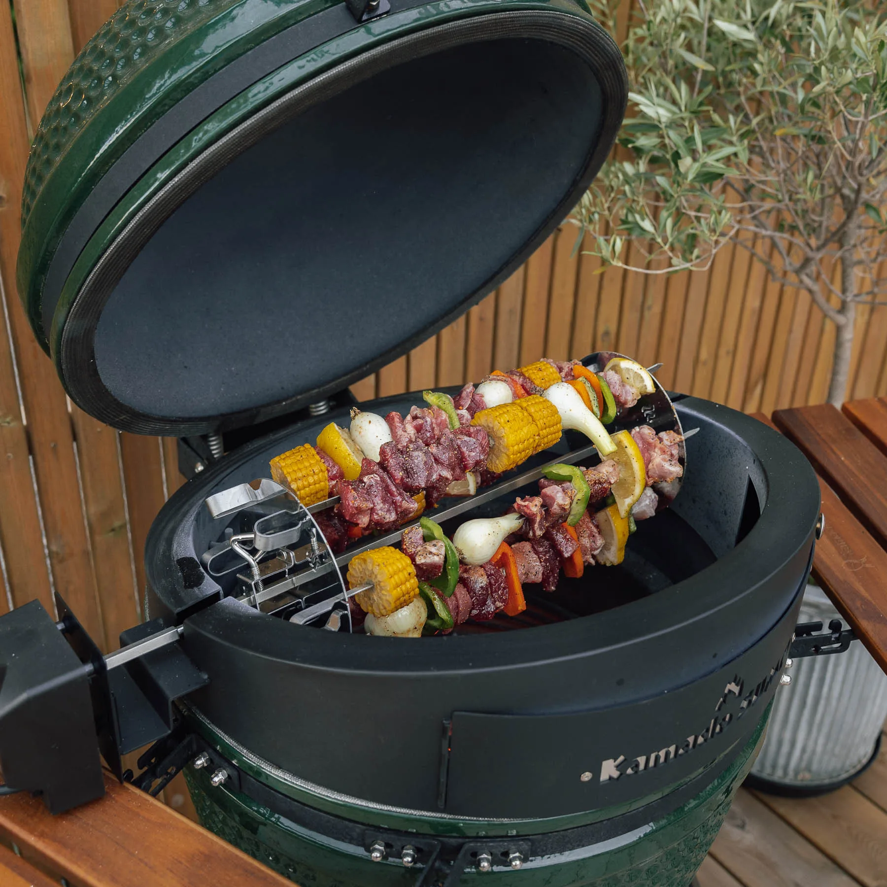 Skewers of meat and vegetables on a Kamado Sumo grill