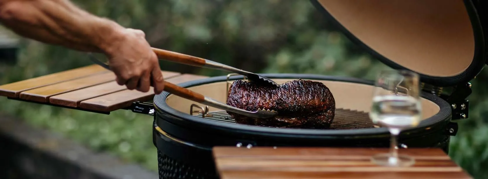 Grilling a perfectly cooked steak on a Kamado Sumo ceramic grill